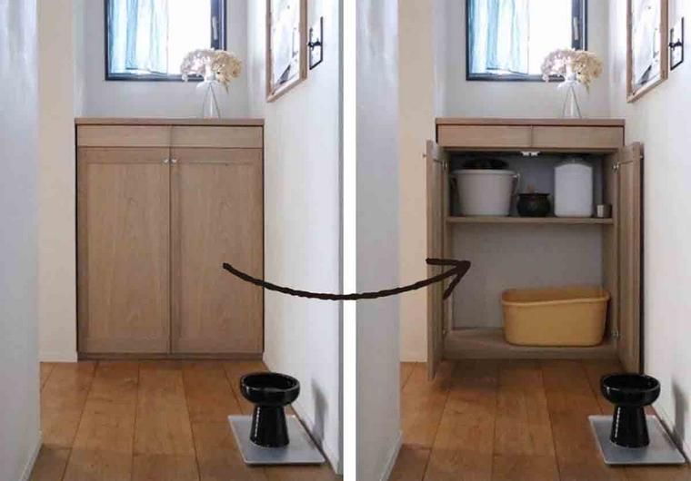 扉を開けると猫用トイレが入っているキャビネット